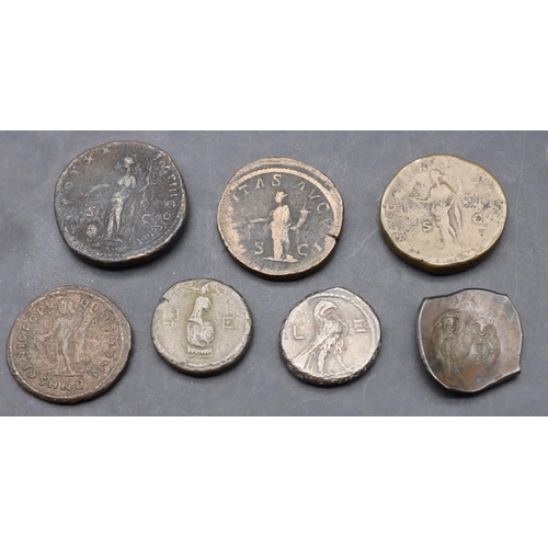 596 - 7 various Roman coins.