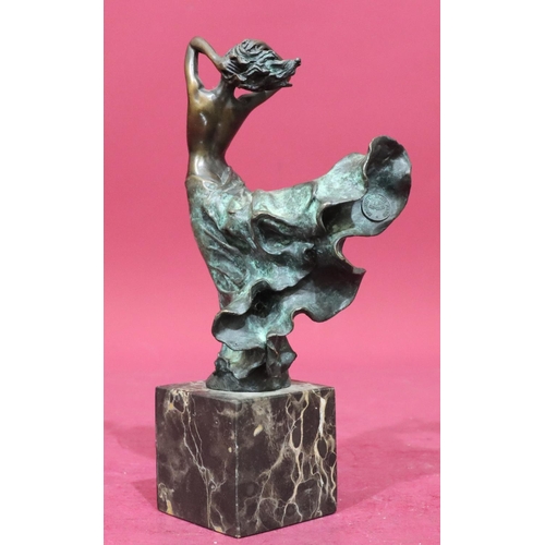 614 - After Milo bronze figure of a standing female in nude in the wind, signed, on square black onyx base... 