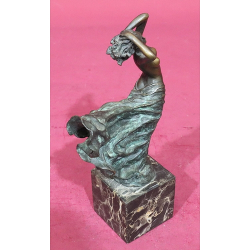 614 - After Milo bronze figure of a standing female in nude in the wind, signed, on square black onyx base... 