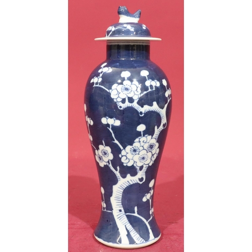 65 - A 19th/20th Century Chinese round bulbous thin neck lidded vase with blue and white branch and bloss... 