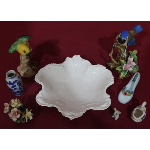 67 - A Royal Crown Derby white scallop shaped dish with raised scroll decoration, 25cm wide, a Beswick fi... 