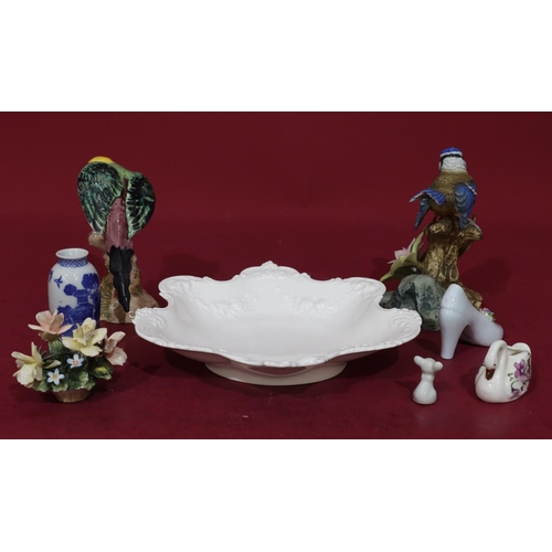 67 - A Royal Crown Derby white scallop shaped dish with raised scroll decoration, 25cm wide, a Beswick fi... 