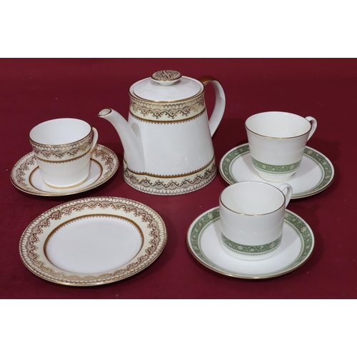 76 - A set of 10 Royal Doulton Rondelay tea cups and saucers, 7 smaller coffee cups and 8 saucers, a mode... 