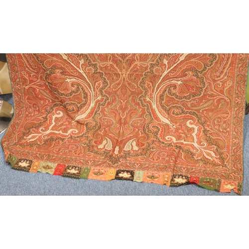 784 - A Persian style woven throw with hand embroidered ends, 324cm x 155cm