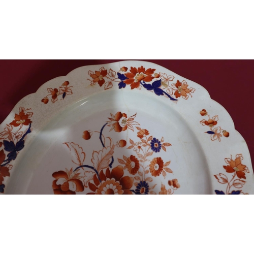 79 - A 19th Century Ironstone rectangular scallop shaped meat plate with multicoloured inset floral, leaf... 