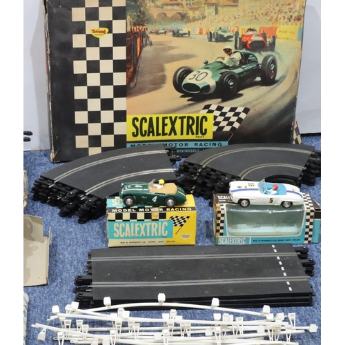 798 - A Tri-Ang Scalextric set (boxed), including track, cornering etc. with Waddington's Formula 1 board ... 