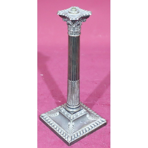 825 - A silver plated corinthian column table lamp on square base (no fitments), 23cm high