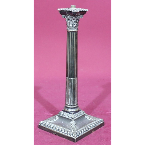 825 - A silver plated corinthian column table lamp on square base (no fitments), 23cm high