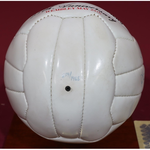 832 - A signed Manchester United European Cup Winner's Cup 25th Anniversary football, signed by George Bes... 