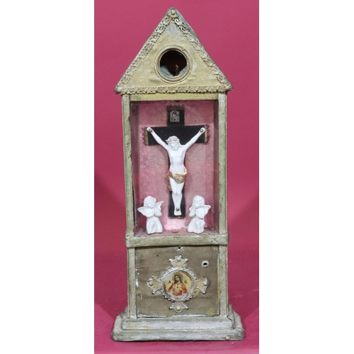 838 - A Continental Altar cabinet enclosing Bisque figure of Christ and 2 cupids, 64cm high, 26cm wide