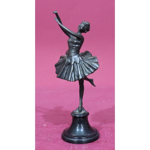 844 - A reproduction bronze figure of a ballerina on black sweeping base, 25cm high