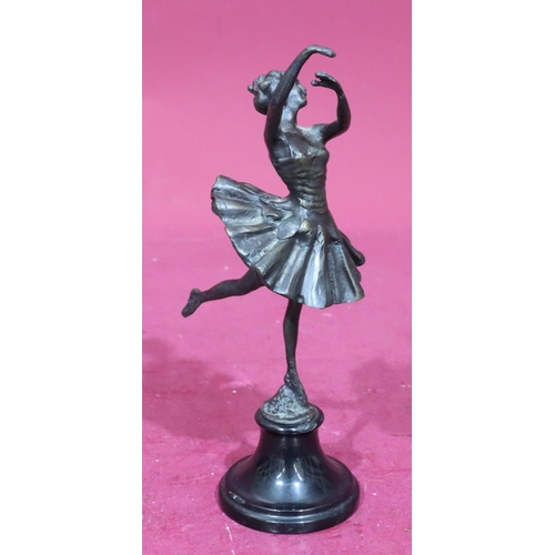 844 - A reproduction bronze figure of a ballerina on black sweeping base, 25cm high