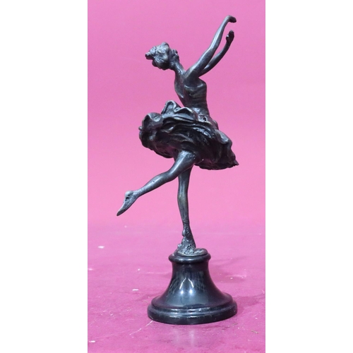 844 - A reproduction bronze figure of a ballerina on black sweeping base, 25cm high