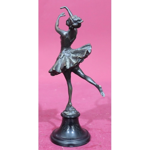 844 - A reproduction bronze figure of a ballerina on black sweeping base, 25cm high