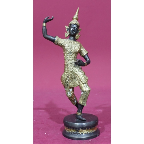 847 - A gilt bronze figure of an Eastern dancer on round base, 30.5cm high