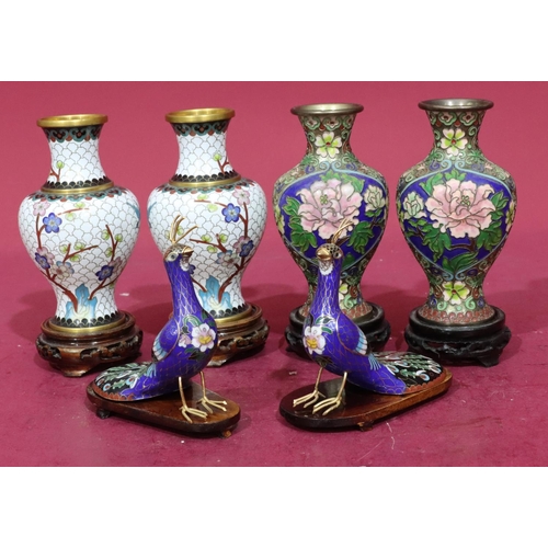 849 - A pair of white cloisonné round bulbous thin neck vases with multicoloured branch and floral decorat... 