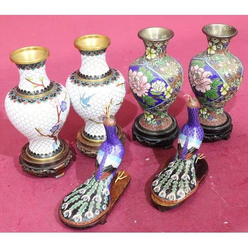 849 - A pair of white cloisonné round bulbous thin neck vases with multicoloured branch and floral decorat... 