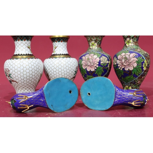 849 - A pair of white cloisonné round bulbous thin neck vases with multicoloured branch and floral decorat... 