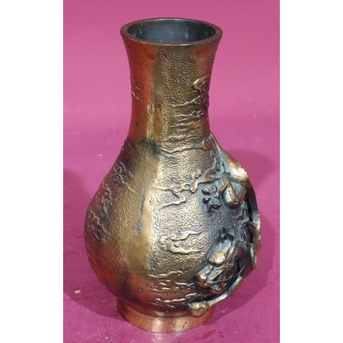 850 - A heavy copper bronze round bulbous thin neck vase with raised dragon motif, 29.5cm high