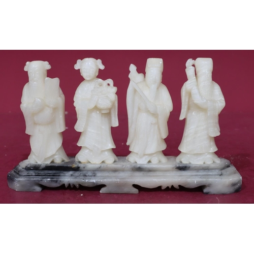 853 - A set of 4 white hardstone figures of Oriental gentlemen and lady, all mounted on single stand, 13cm... 