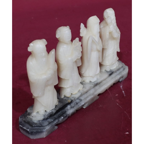 853 - A set of 4 white hardstone figures of Oriental gentlemen and lady, all mounted on single stand, 13cm... 