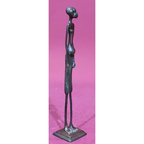 854 - A bronze figure of an African lady on square base, 30.5cm high