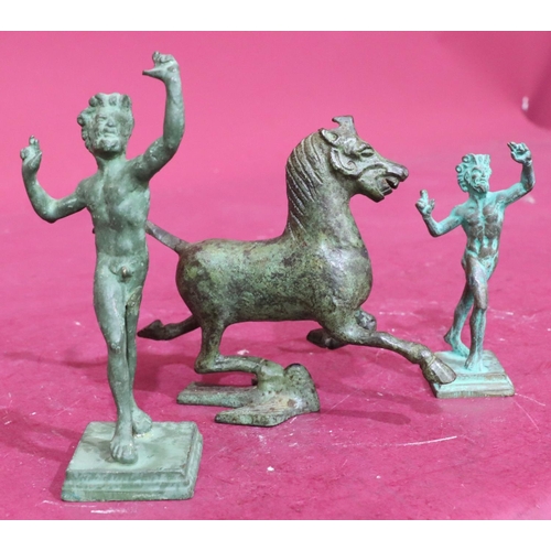 855 - A bronze figure of a galloping horse, 2 similar green bronze figures of standing gentleman on square... 