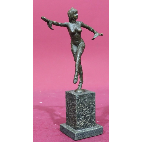 885 - A reproduction bronze figure of a a 1920's dancer with square platform base, 28cm high