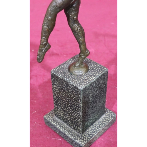 885 - A reproduction bronze figure of a a 1920's dancer with square platform base, 28cm high