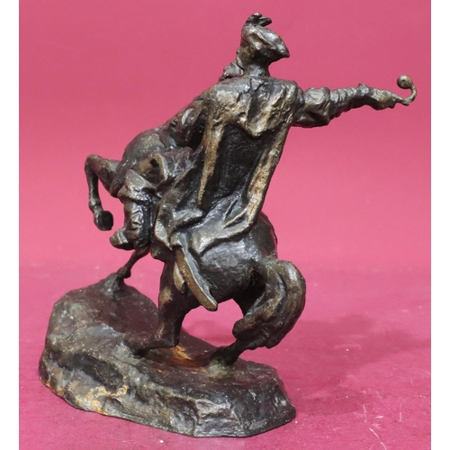 886 - A bronze group of figure on horseback, 24.5cm high