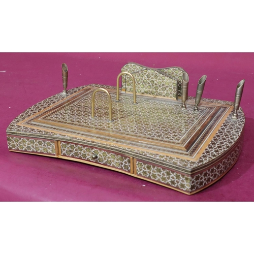 887 - An Eastern style lacquered rectangular shaped desk stand with single drawer mounted with stationery ... 