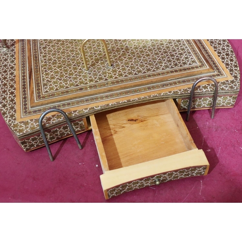 887 - An Eastern style lacquered rectangular shaped desk stand with single drawer mounted with stationery ... 