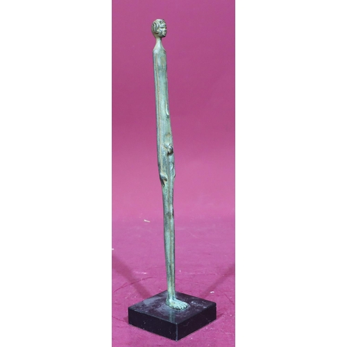 892 - A tall narrow bronze figure of a naked gentleman on square base, 39cm high