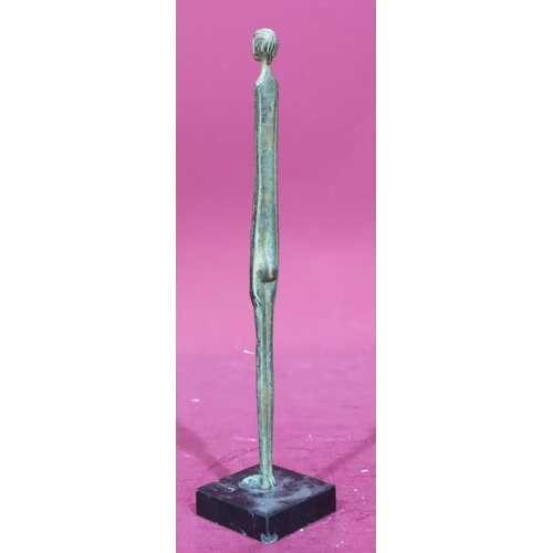 892 - A tall narrow bronze figure of a naked gentleman on square base, 39cm high