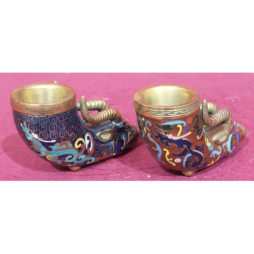 893 - 2 gilt metal and cloisonné ashtrays in the form of animal heads, 8cm high, 13cm long (2)