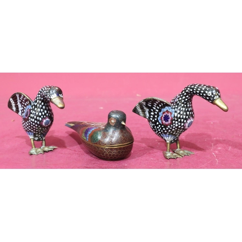 894 - A pair of cloisonné and gilt metal figures of birds on black and white ground, 9.2cm high, an Orient... 