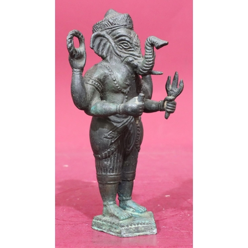 895 - A bronze figure of a standing elephant God, 22cm high