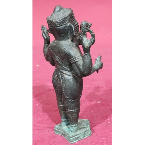 895 - A bronze figure of a standing elephant God, 22cm high