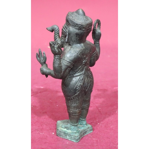 895 - A bronze figure of a standing elephant God, 22cm high