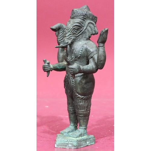 895 - A bronze figure of a standing elephant God, 22cm high