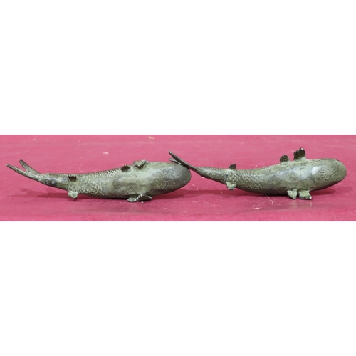 896 - A pair of bronze figures on fish, 18.5cm long