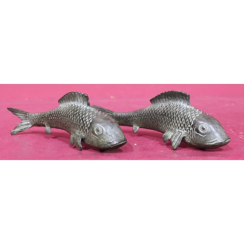 896 - A pair of bronze figures on fish, 18.5cm long