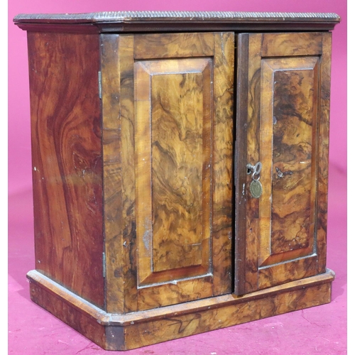 899 - A Victorian burr walnut table top coin collector's cabinet with banded decoration, 2 panel doors enc... 