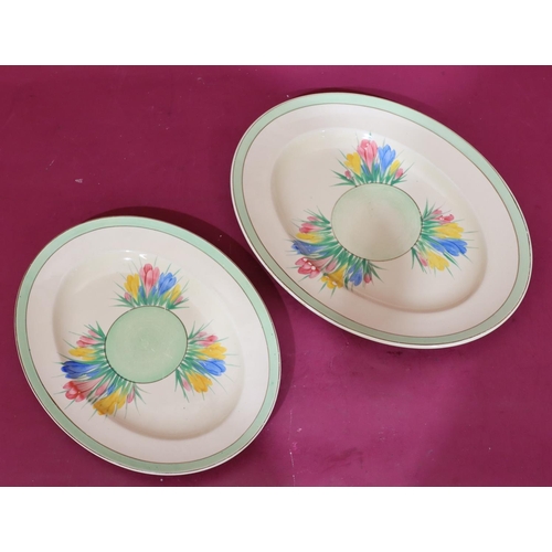 90 - 2 Clarice Cliff oval graduated meat plates on white and green ground with crocus pattern decoration,... 