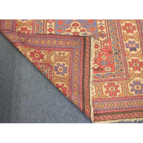 906 - A Kilim style rug on red, blue and cream ground with centre medallion and allover floral motifs, 220... 