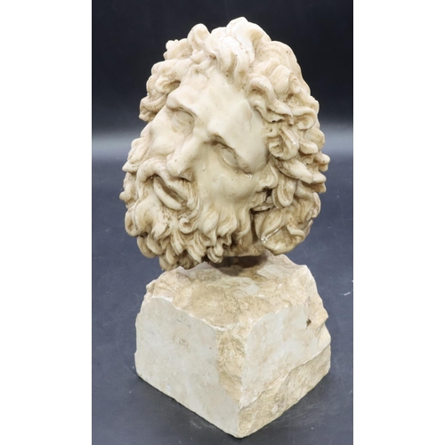 907 - A continental classical figurehead, of a gentleman, on spike mounted on stone base 30cm high.