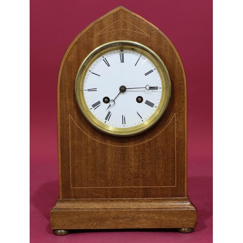 914 - An Edwardian mahogany 8-day striking mantel clock with inlaid stringing, round white enamel dial wit... 