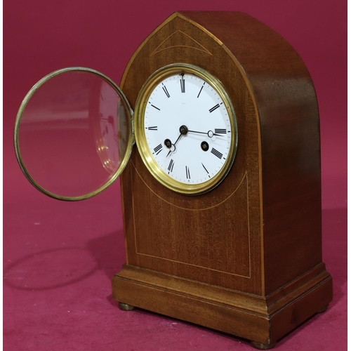 914 - An Edwardian mahogany 8-day striking mantel clock with inlaid stringing, round white enamel dial wit... 