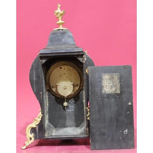 917 - An ebonised and boulle mantel clock with allover raised gilt metal shell, leaf and scroll decoration... 