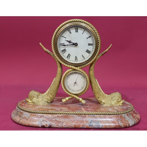 920 - A 19th Century ormolu timepiece with separate barometer supported by 2 fish with allover rope style ... 